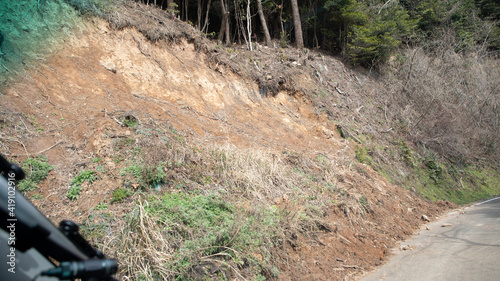 A mountain road that has collapsed due to flooding