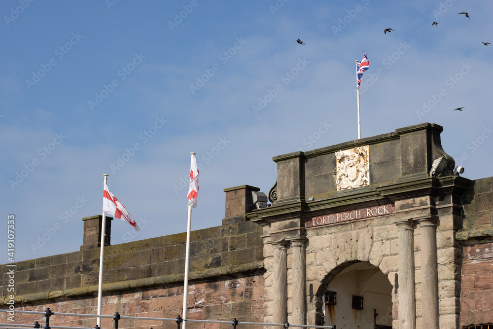 flags on the top of the castle