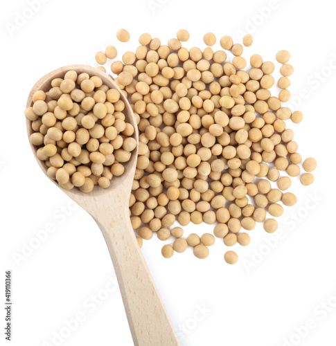 Soya beans with wooden spoon isolated on white, top view