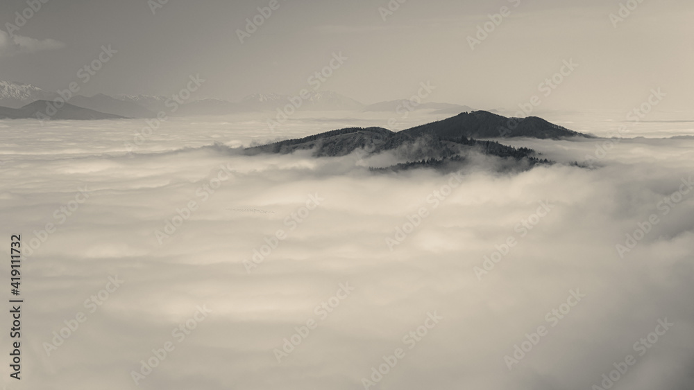 Mysterious island above the sea of clouds