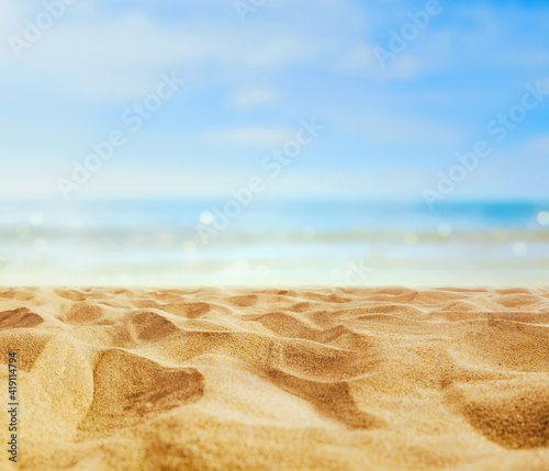 Empty sand beach in front of summer sea  with copy space