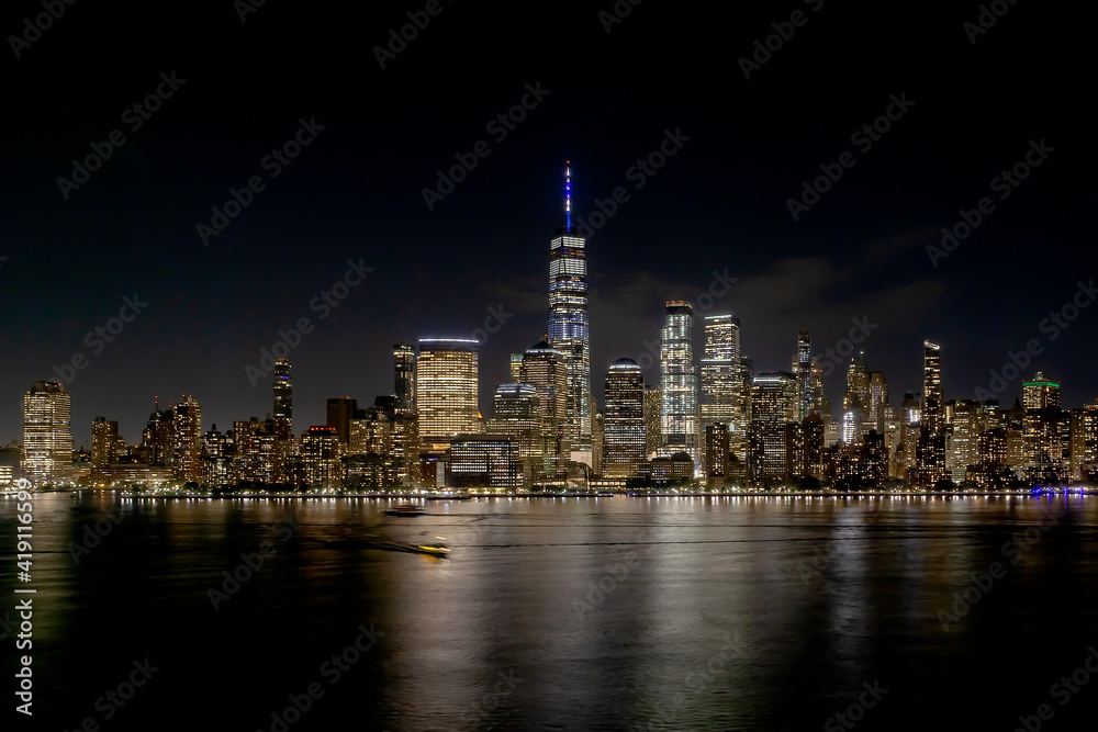 View of Lower Manhattan skyline and Financial District New York City taken from Jersey City, New Jersey showing the Hudson River