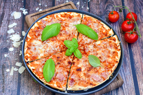  Home made italian pizza with mushrooms,ham and cheese. Italian food