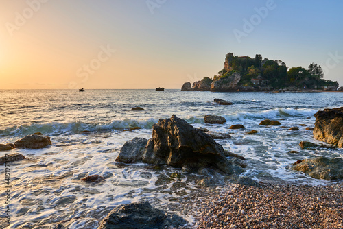 Fototapeta Naklejka Na Ścianę i Meble -  Isola Bella in Taormina Sicily, in the early morning hours on a late winter day.