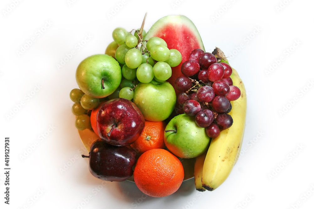 A variety of fresh fruit on one plate.