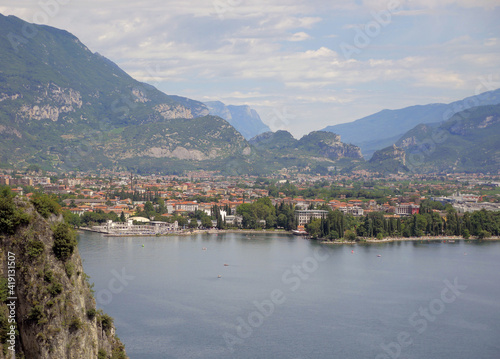 Panorama of a small town on Lake Garda. Riva del Garda seen from the top of a mountain. Summer in Italy.