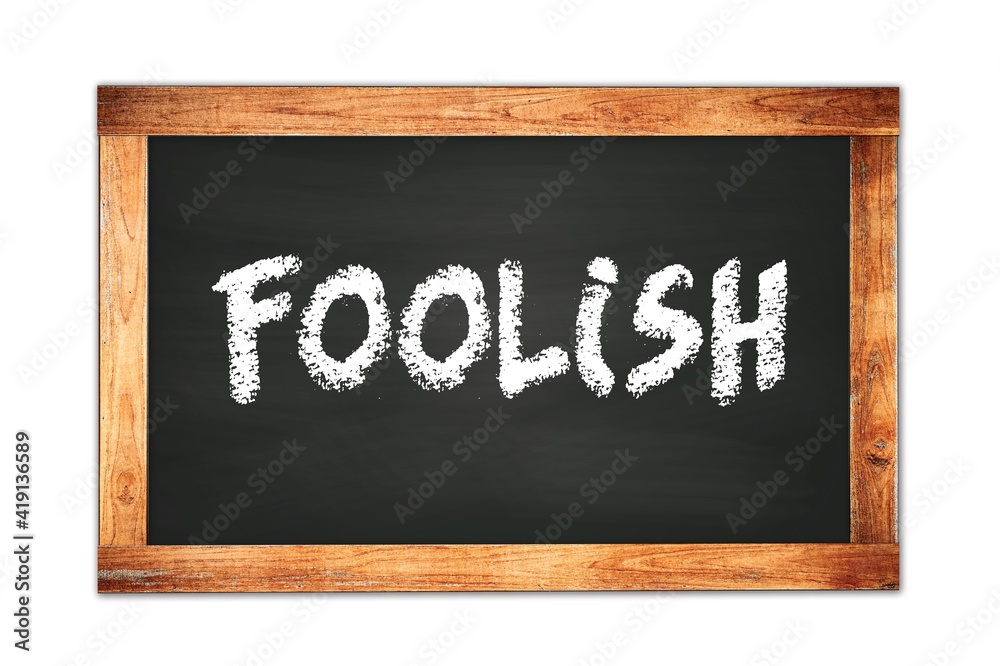 FOOLISH text written on wooden frame school blackboard. FOOLISH text written on wooden frame school blackboard.