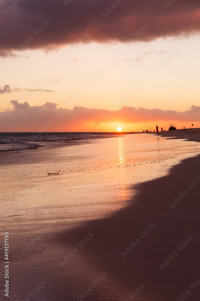 Orange sunrise over Atlantic Ocean. Bavaro beach