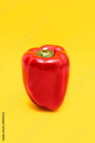 Peppers, red on yellow background, © Enrique Micaelo 