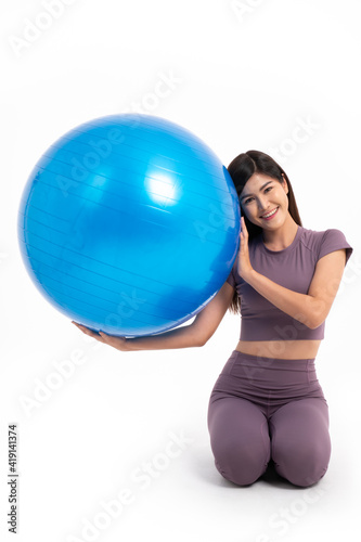 Healthy Asian woman workout with fitball on isolated white background, Concept of good health starts with exercise.