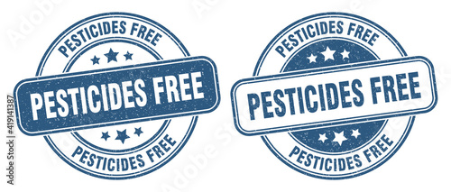 pesticides free stamp. pesticides free label. round grunge sign