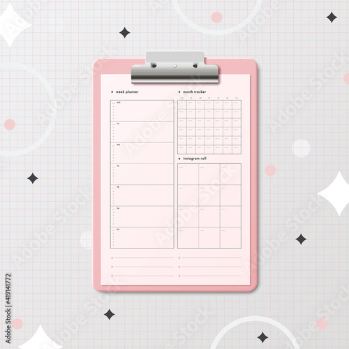 Clipboard with planner for week, month, social media posting plane and notes.