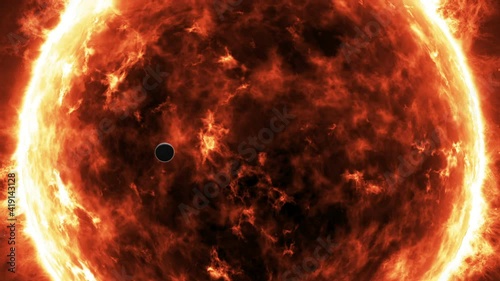 Planet Mercury slowly passing in front of rotating solar star. Magnetic storm, burning solar surface with prominences and glowing sparks on the black starry space sky.