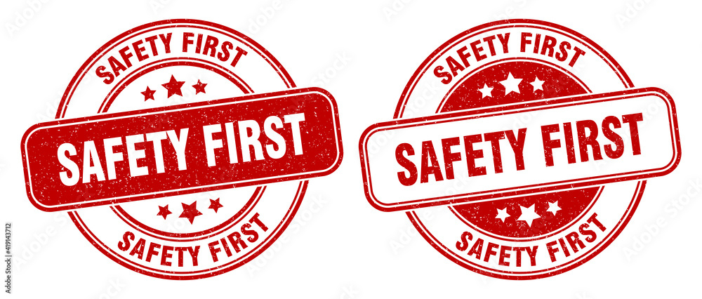 safety first stamp. safety first label. round grunge sign safety first stamp. safety first label. round grunge sign