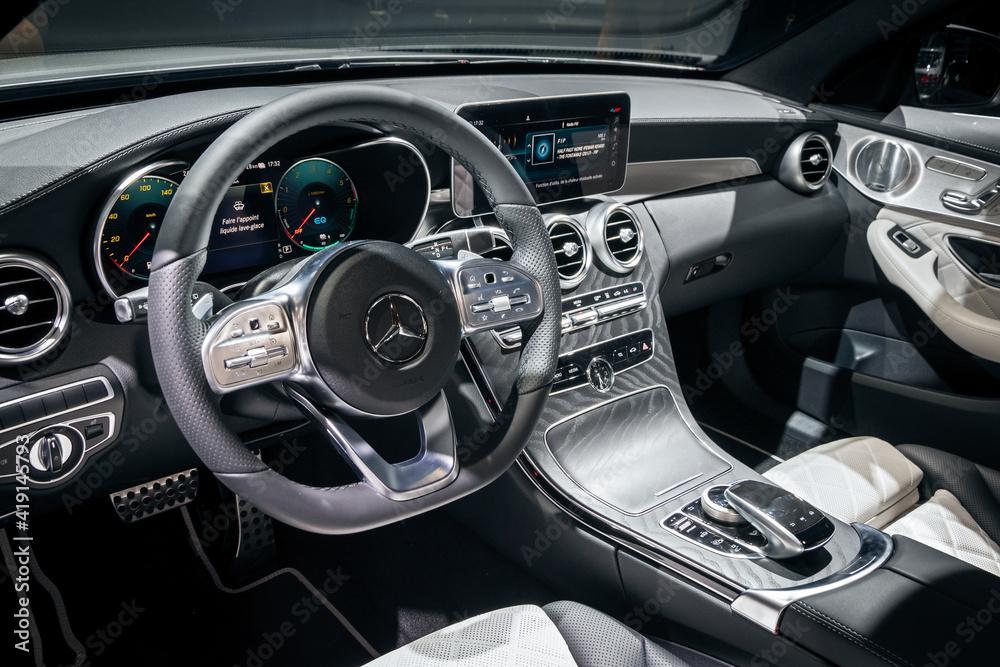Mercedes-Benz C-class car modern digital interior dashboard and steering  wheel. Photos