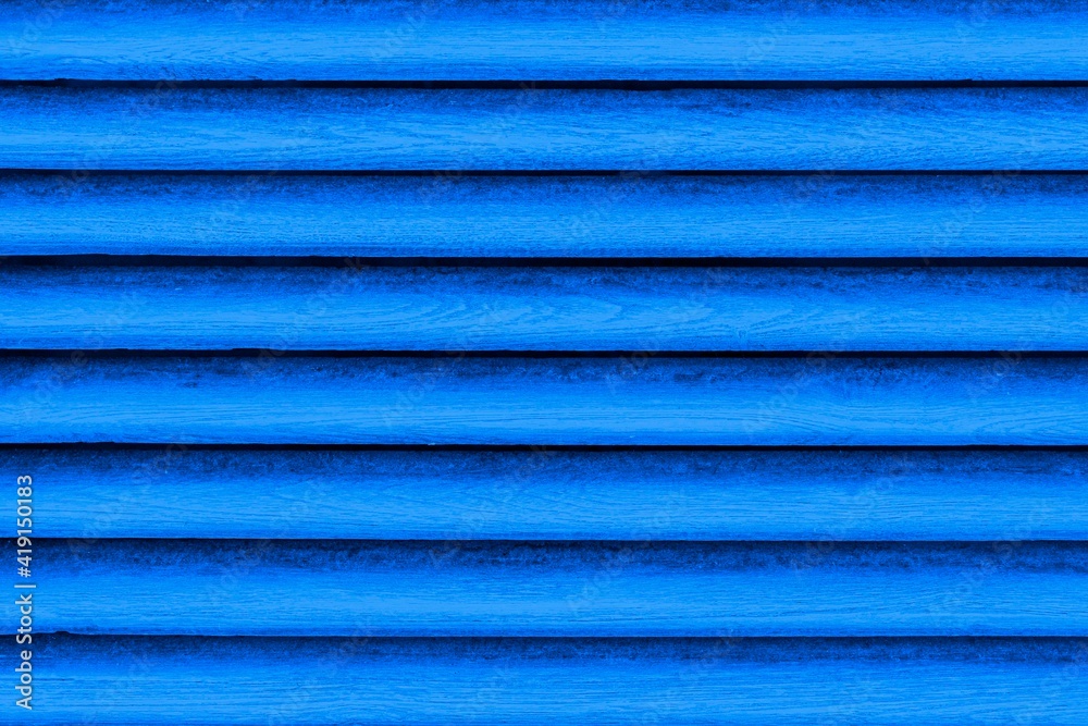 Old blue wooden fence shutter lattice texture and background seamless