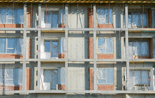 Construction site. A flat apartments building. Industrial view.