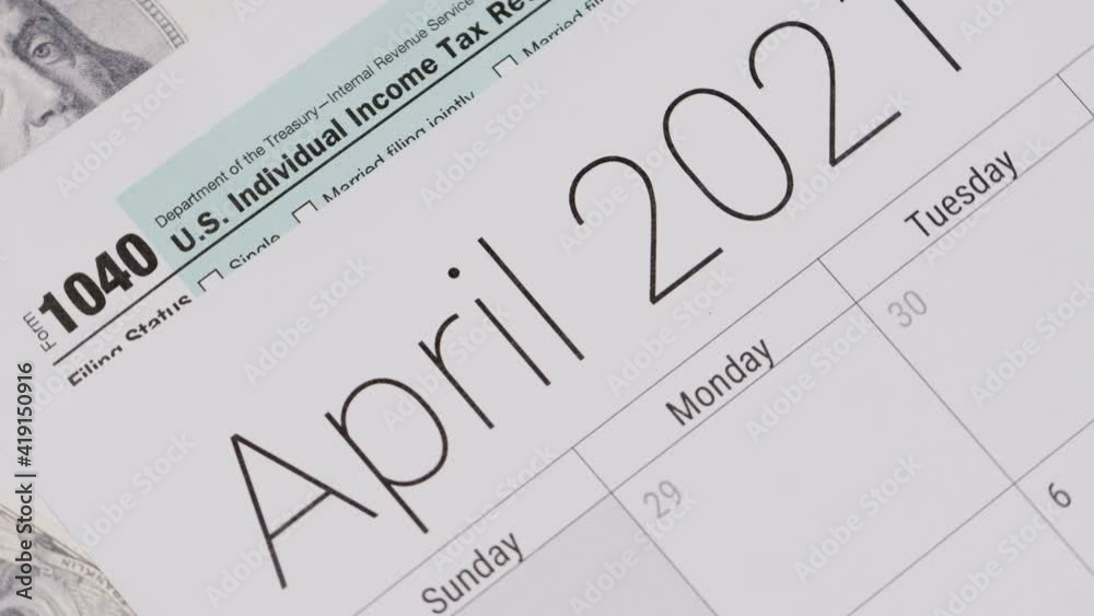 Tax day on April 15 calendar. Deadline for 1040 form return.