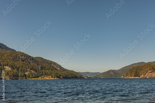 Lake in valley, landscape in sunny day © Emil