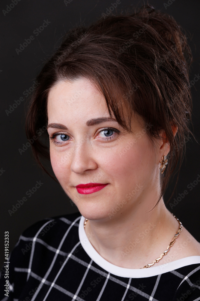 Portrait of a beautiful middle-aged woman. A woman of thirty or thirty-five. Portrait of a beautiful middle-aged woman. A woman of thirty or thirty-five.
