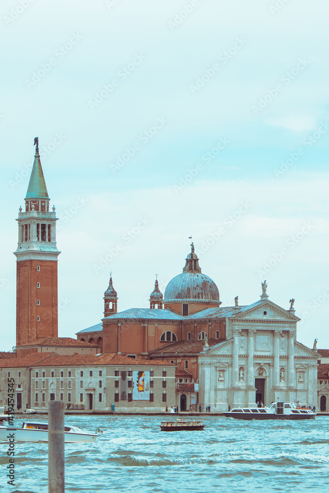 Fototapeta premium view of Church of San Giorgio Maggiore boats before it famous landmark place
