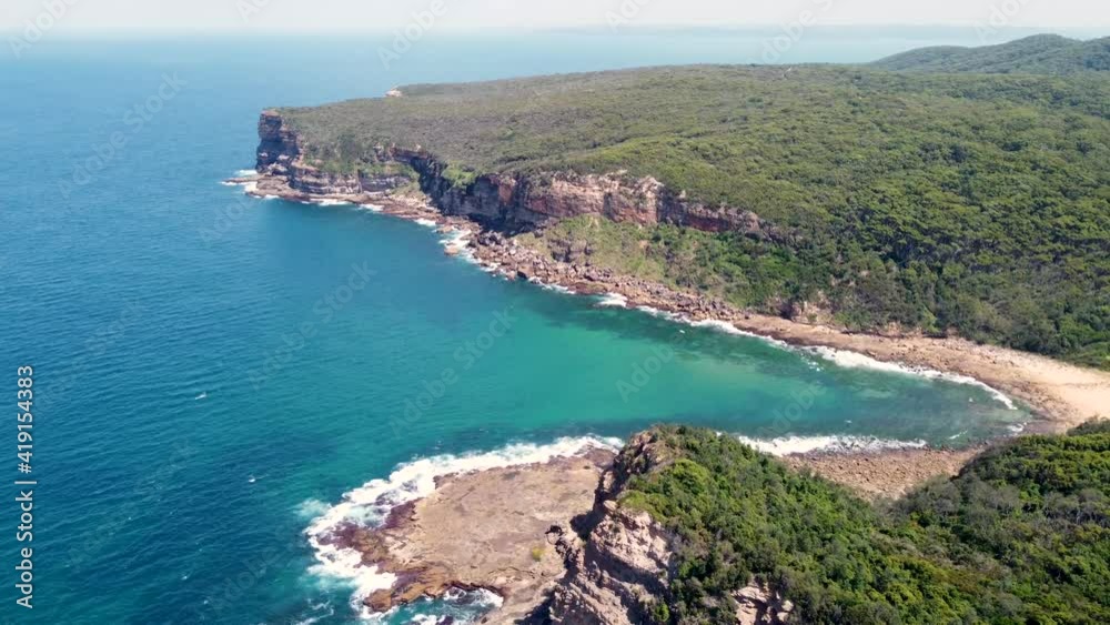 Drone pan shot over Bouddi National Park headland coastline of Little Beach Macmasters NSW Central Coast Australia 3840x2160 4K Drone pan shot over Bouddi National Park headland coastline of Little Beach Macmasters NSW Central Coast Australia 3840x2160 4K