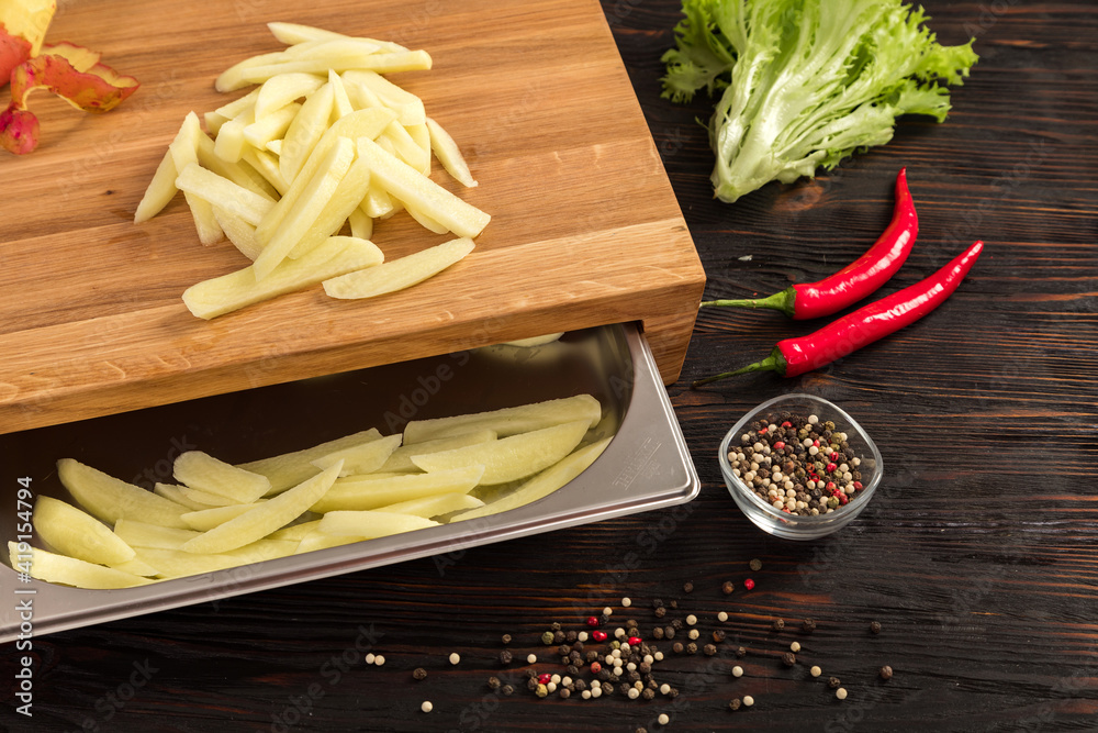 Fresh vegetables, herbs and spices on a cutting board