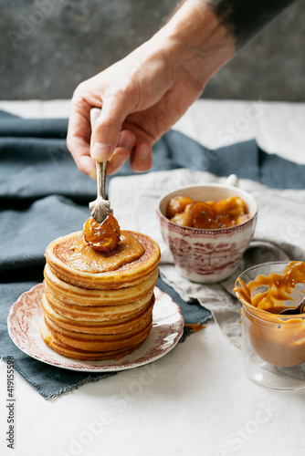 Home made vegan, plant-based, vegetarian pancakes served with in vintage tray wit