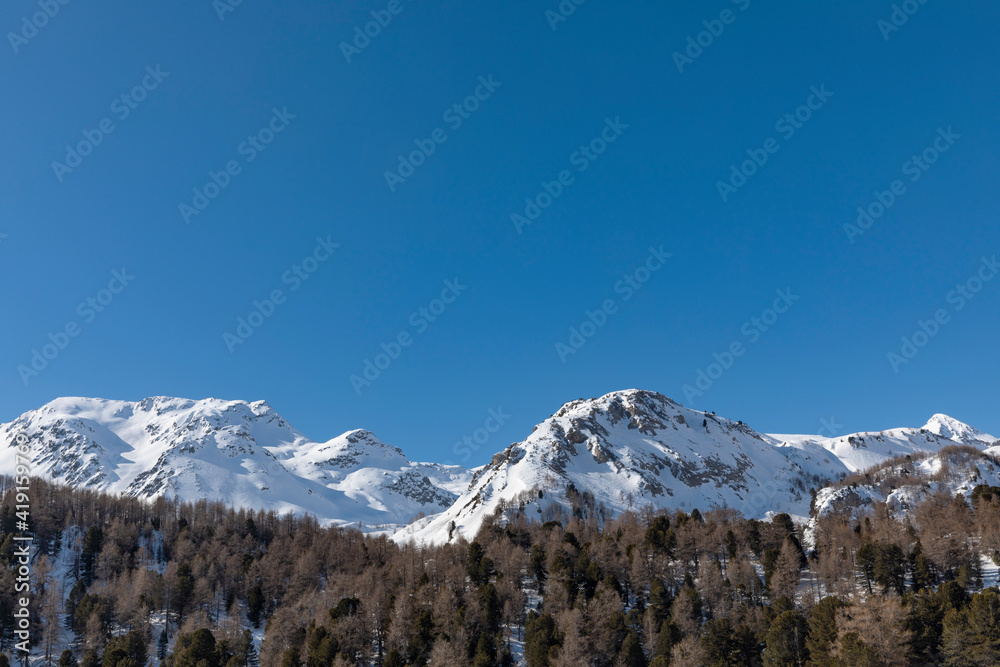 Detail of the snowy mountain top on Lukmanier on the Swiss Alps in Ticino