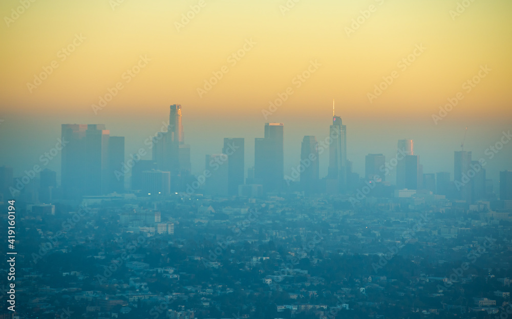 View of Downtown Los Angeles, California skyscrapers during colorful sunset