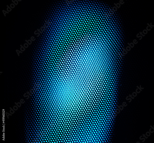 Close up macro wire mesh texture on audio microphone pop shield