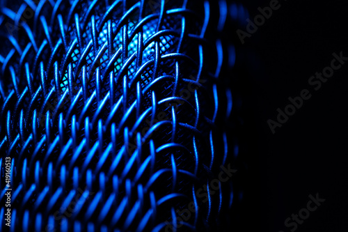 Close up macro wire mesh texture on audio microphone head