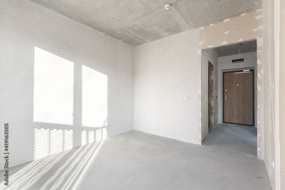 interior of the apartment without decoration in gray colors. rough finish interior of the apartment without decoration in gray colors. rough finish