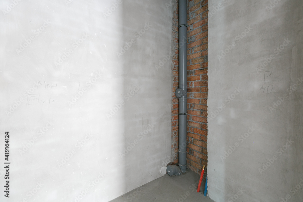 interior of the apartment without decoration in gray colors. rough finish