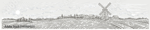 Rural landscape panoramic format with a Windmill and village. Hand drawn Illustration in engraving style.