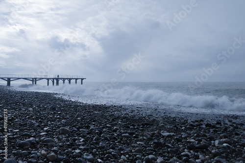 The wave hits the shore with a large pebble. Black Sea, summer vacation. Rocks on the coastline, Batumi Adjara Georgia © ni