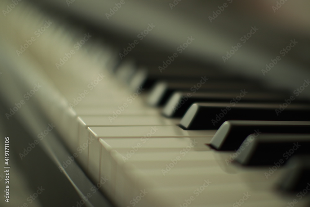 piano keys diagonally in bokeh