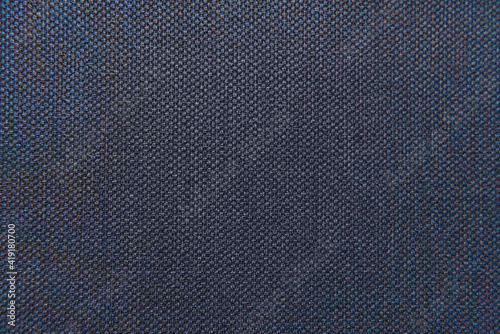 background of dark blue, textured surface, with sackcloth imitation, top view