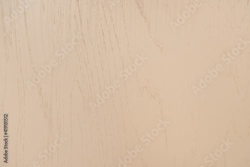 background of pastel brown, wooden laminate surface, top view