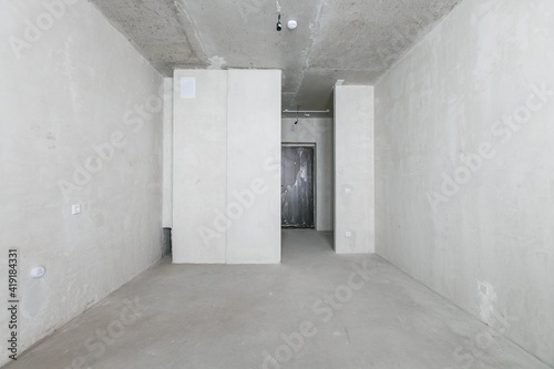 interior of the apartment without decoration in gray colors. rough finish