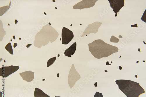 background with abstract black and grey spots, top view
