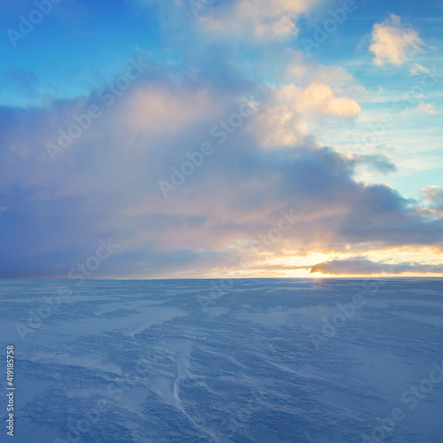 Beautiful sky over the snow covered land