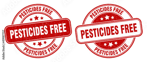 pesticides free stamp. pesticides free label. round grunge sign