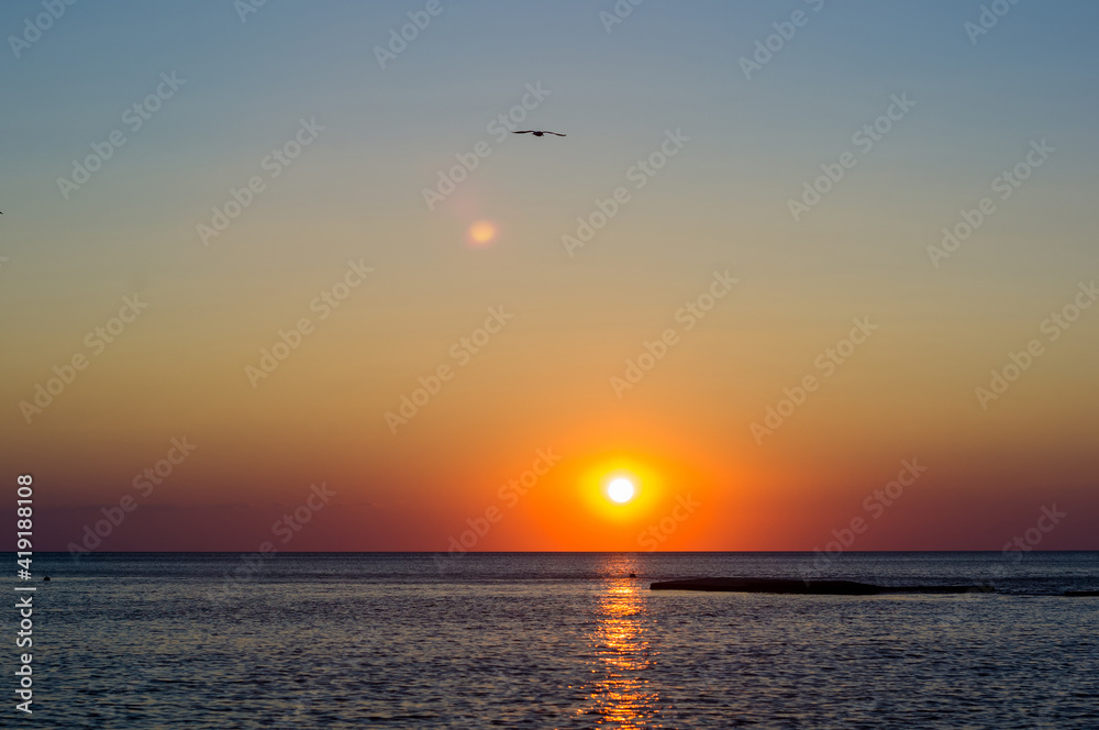 Amazing sea sunset, the sun, waves, clouds Amazing sea sunset, the sun, waves, clouds