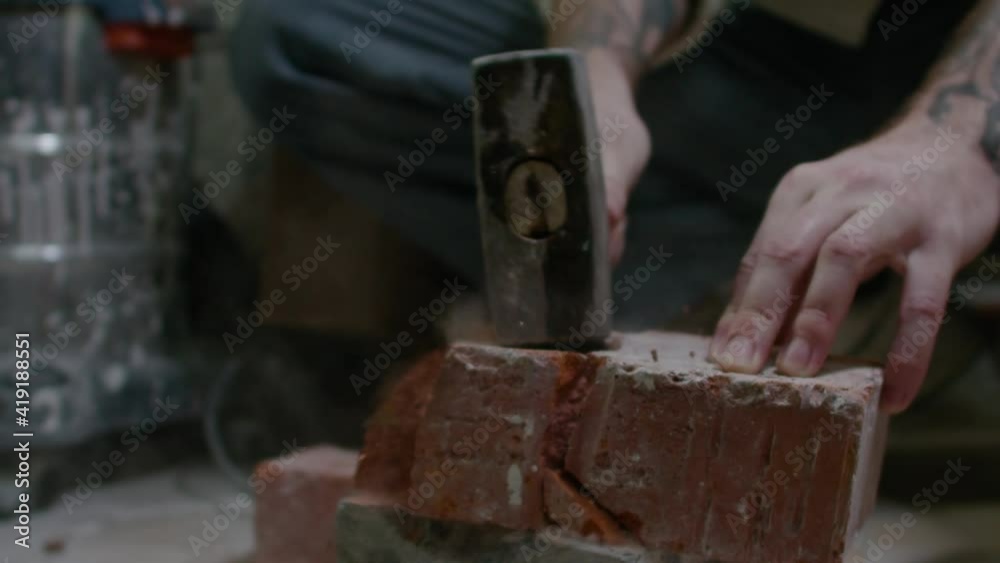 Super Slow Motion Detail Shot of Smashing Brick with Sledgehammer at 1000fps. Super Slow Motion Detail Shot of Smashing Brick with Sledgehammer at 1000fps.