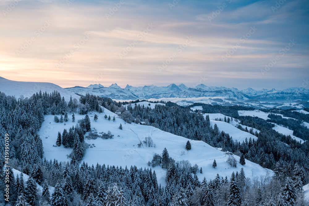 view from Lüderenalp over the hills of Emmental on beautiful winter morning in winter