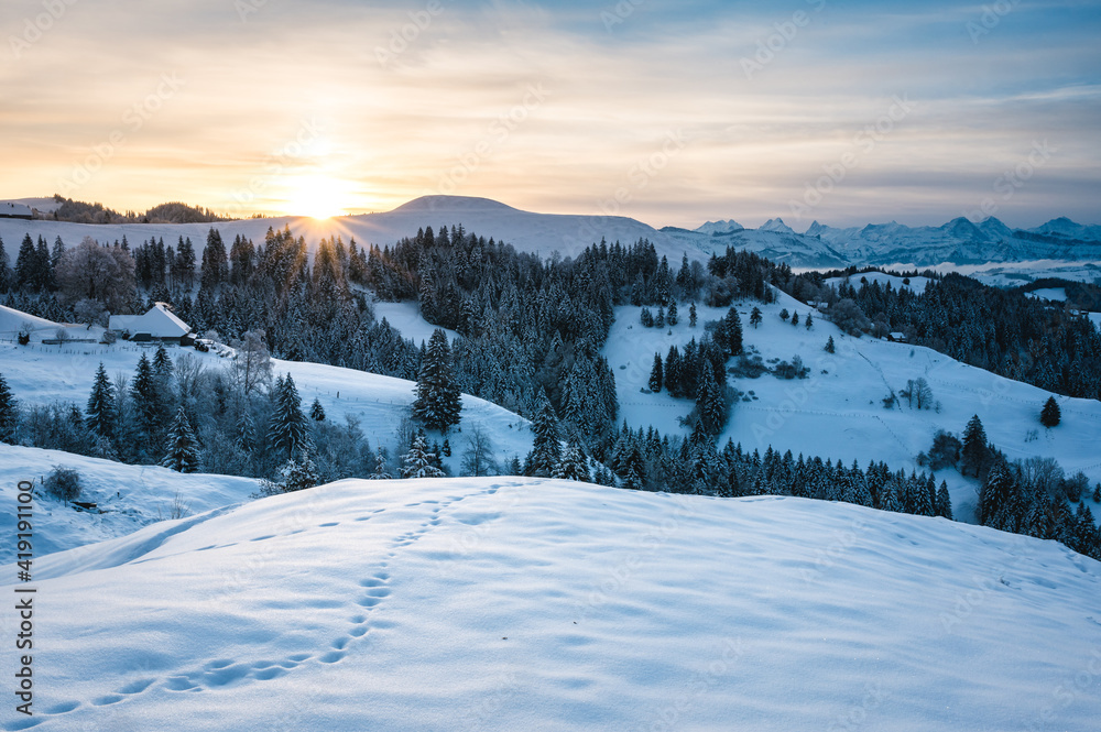 view from Lüderenalp over the hills of Emmental on beautiful winter morning in winter