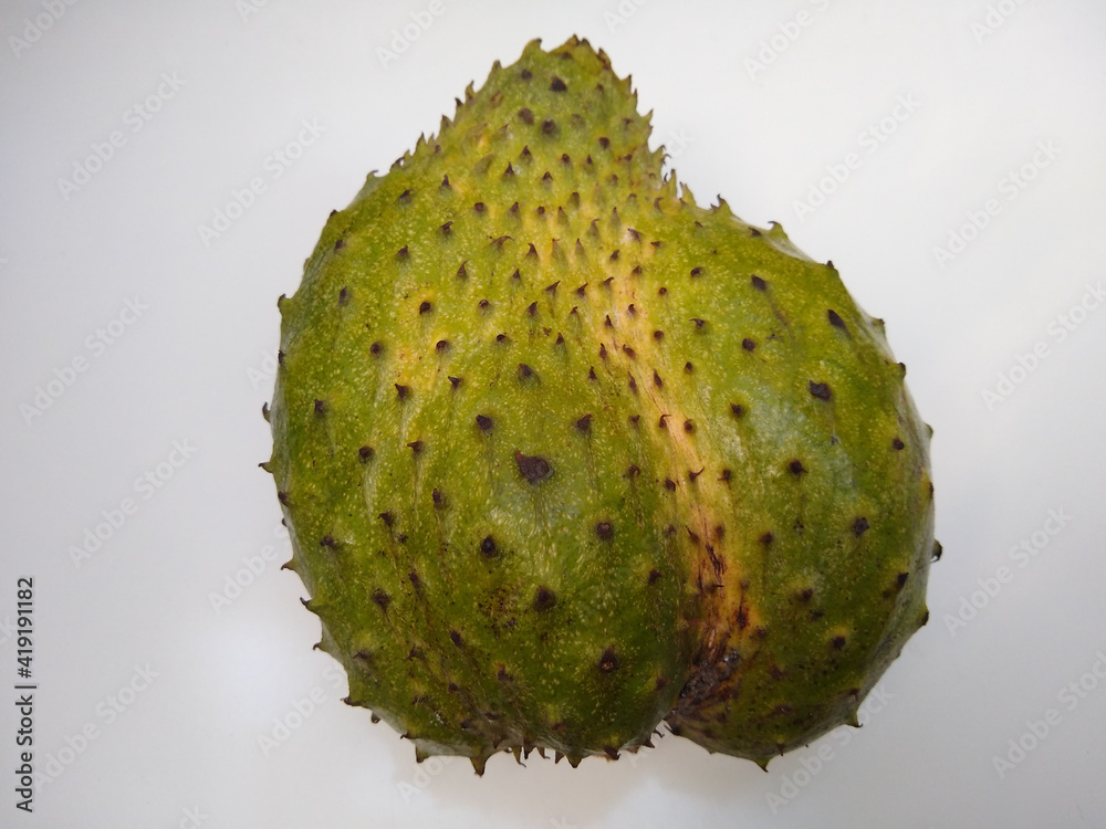 Soursop (graviola) fruit isolated on white background Soursop (graviola) fruit isolated on white background