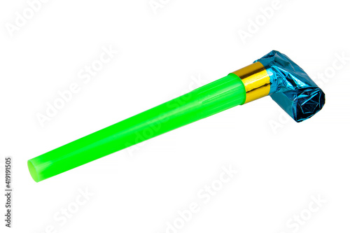 Rolled bright festive noisemaker or party whistle horn isolated on the white background