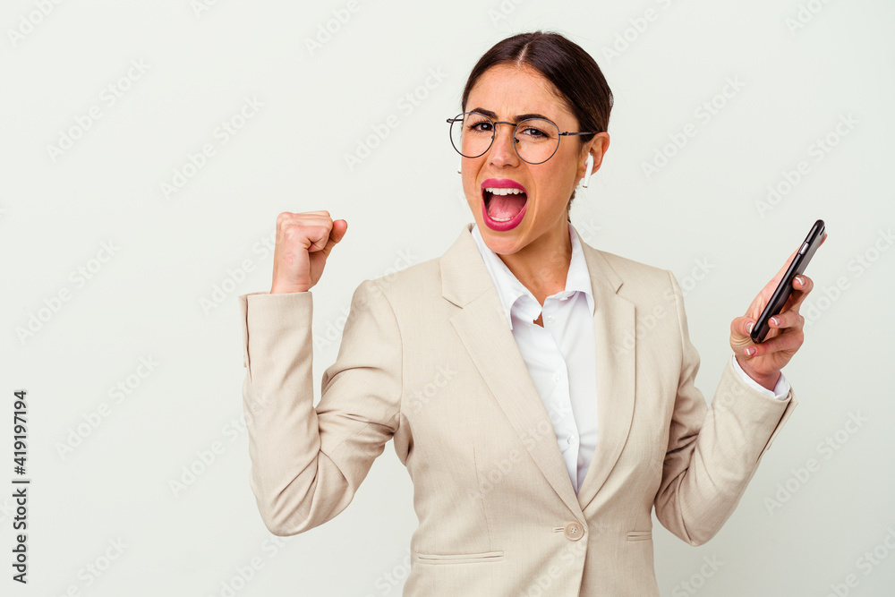 Young business woman holding a mobile phone isolated on white background Young business woman holding a mobile phone isolated on white background